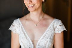 Brautporträt bei der Hochzeit auf der Gutsalm Harlachberg